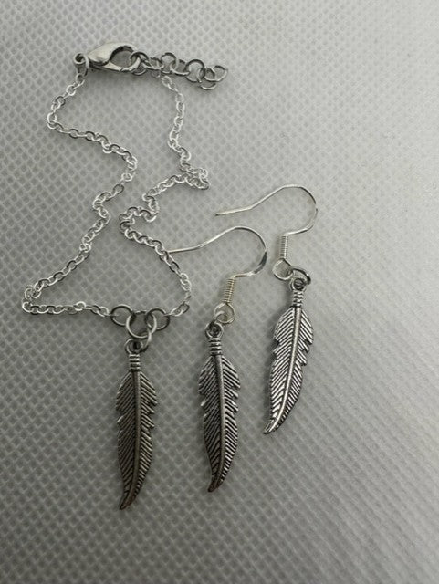 Feather earrings and ankle bracelet