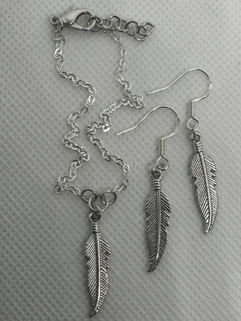 Feather earrings and ankle bracelet